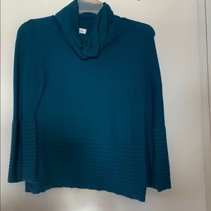 Calvin Klein sweater with bubble sleeves.